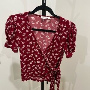 All in Favor Burgundy Floral Wrap Blouse